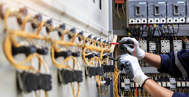 Professional Electrician technician working in Pitcairn, PA